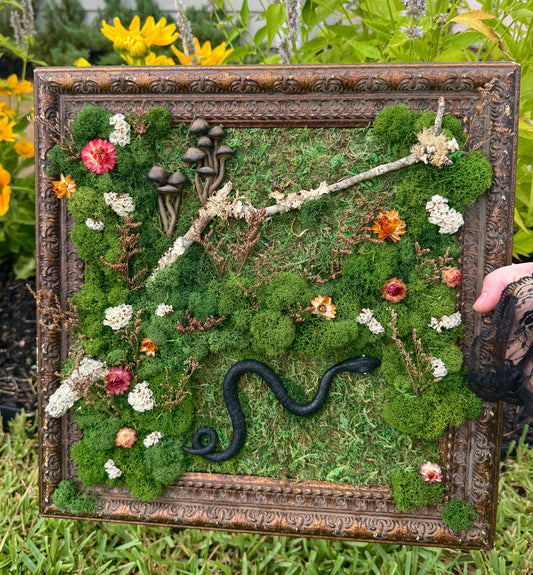 Large moss art with snake