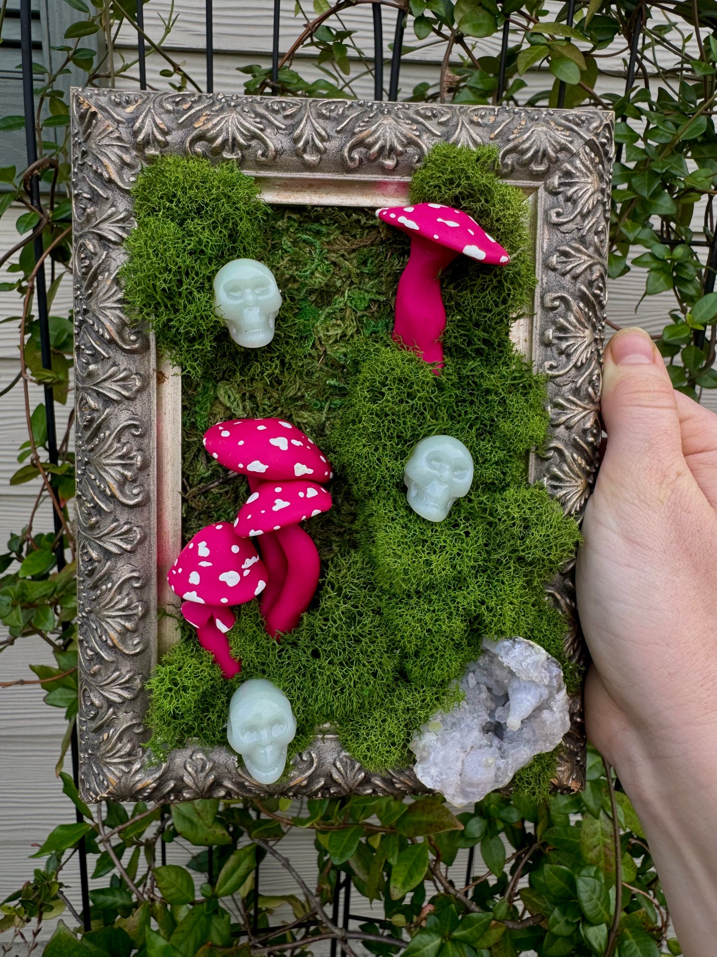 Moss art with skulls